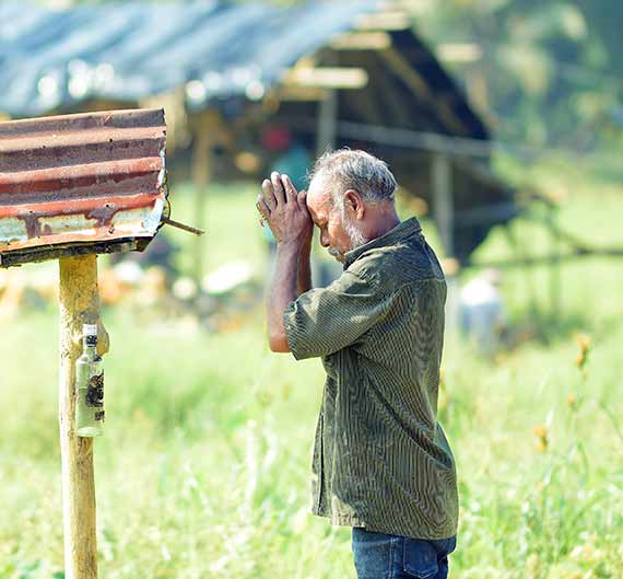 A community member near a Sri Lankan gem field